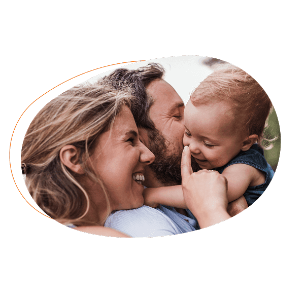 Man and woman with smiling baby