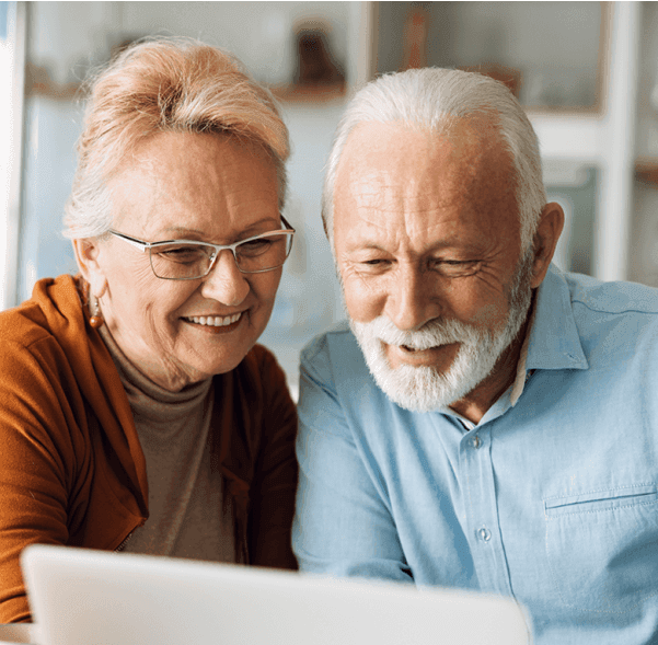Older couple looking at laptop