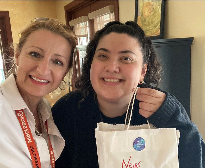 Two women with gift bag